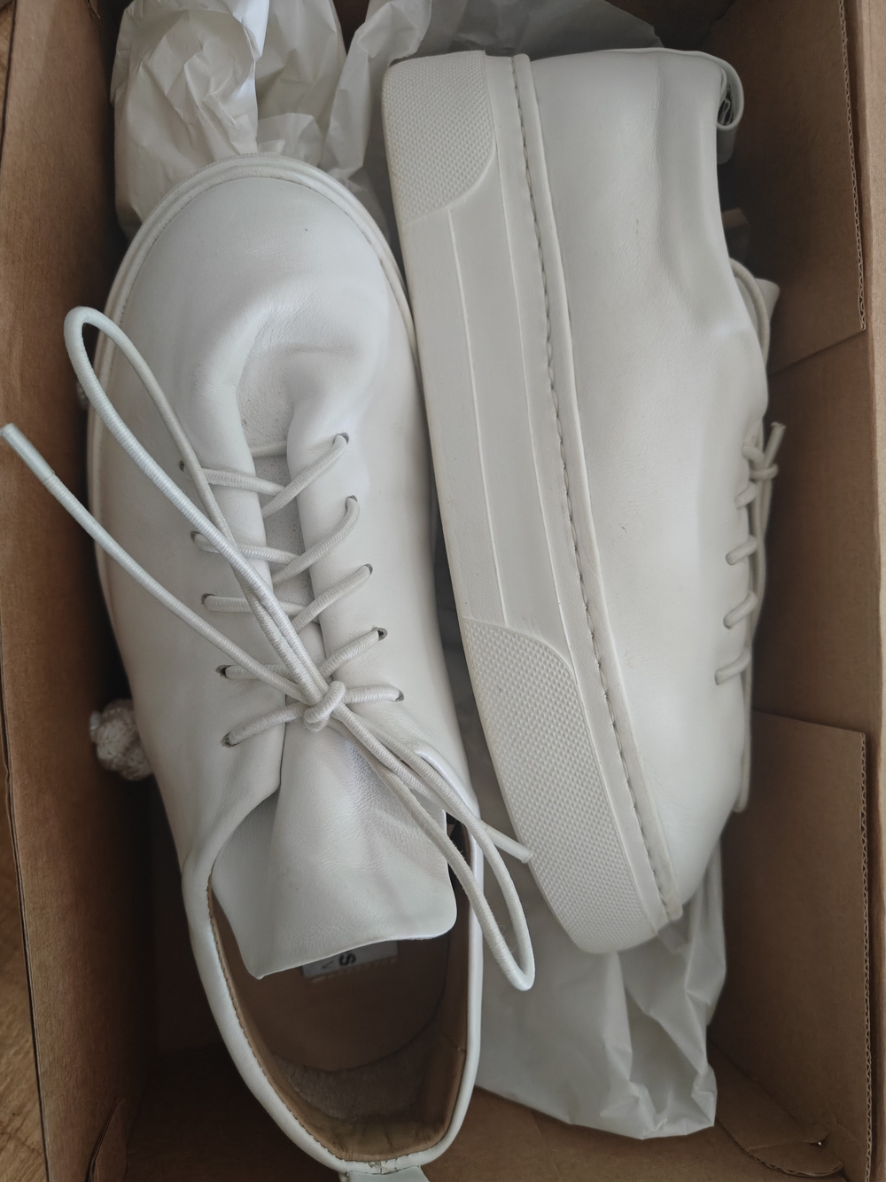 Woman's All-White Low-Top Lace-Up Sneakers